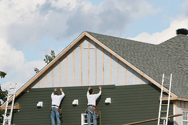 Professional Emergency Siding Repair technician working in Rochester, NY